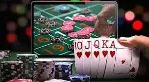 Screenshot of slotbabon table lobby showing Dragon Tiger, Sic Bo, and Roulette with minimum and maximum bet limits displayed